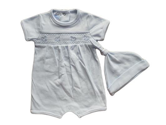 A blue rocking horse romper and matching hat set for babies, with visible snap closures on the romper.