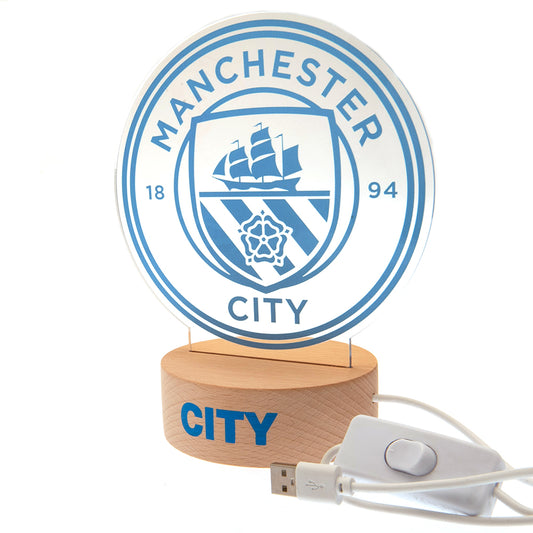 LED desk light with a wooden base and clear plastic insert featuring the City crest