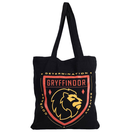 Black canvas tote bag featuring a large red and yellow Gryffindor crest to one side