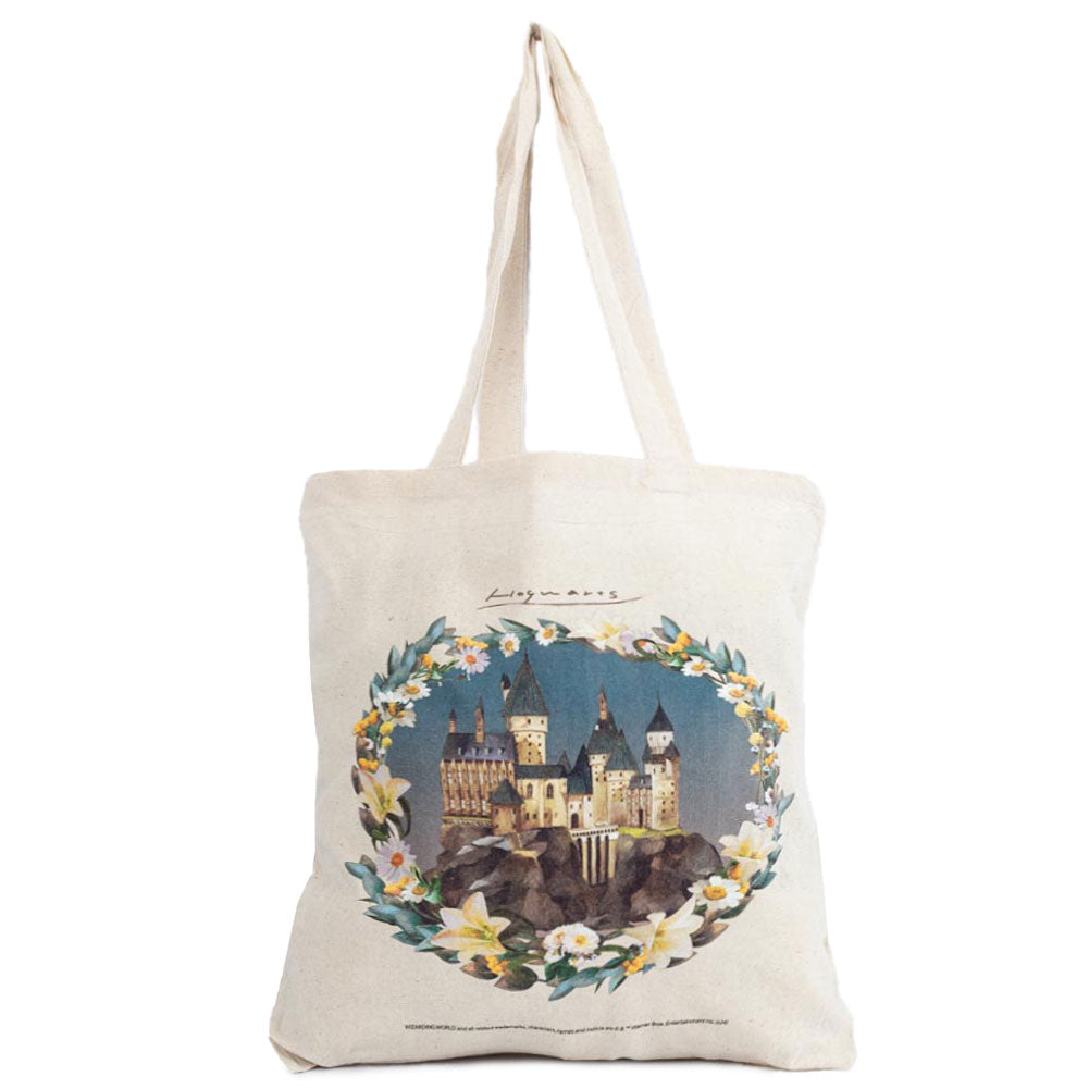 Cream tote bag featuring a picturesque image of Hogwarts surrounded by pretty flowers