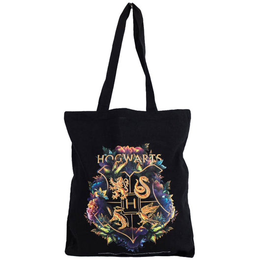 Black canvas tote bag featuring a large gold printed Hogwarts crest surrounded by colourful flowers