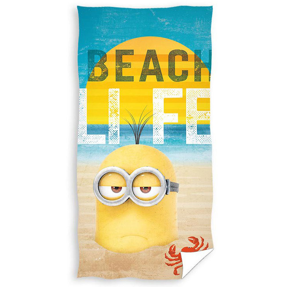 Large soft to touch velour beach towel, Beach themed towel featuring the text 'Beach Life' with one of the Minions submerged in sand