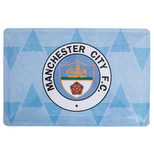 Sky blue metal sign featuring a retro, full colour Man City FC crest in the centre