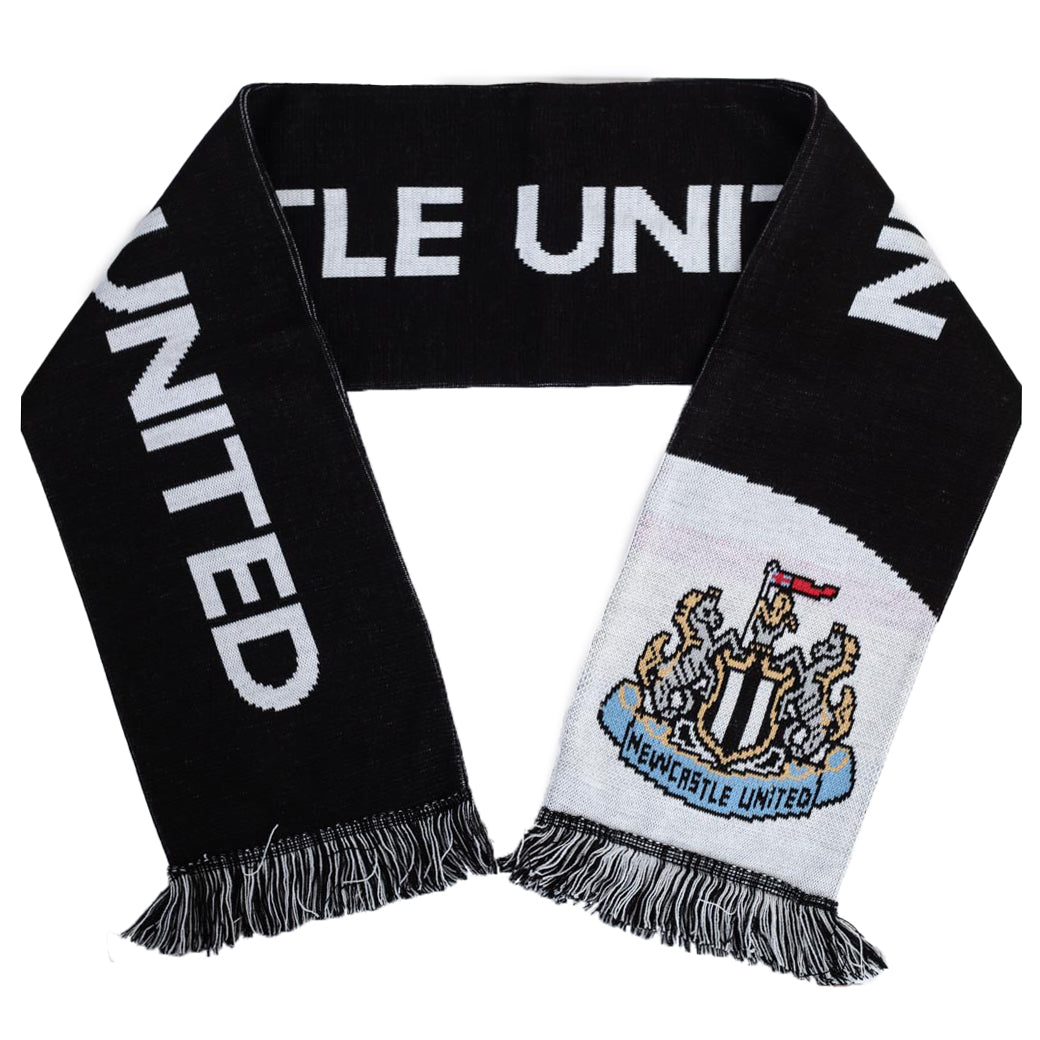 Black reversible jacquard knit scarf with a blck and white fringe
