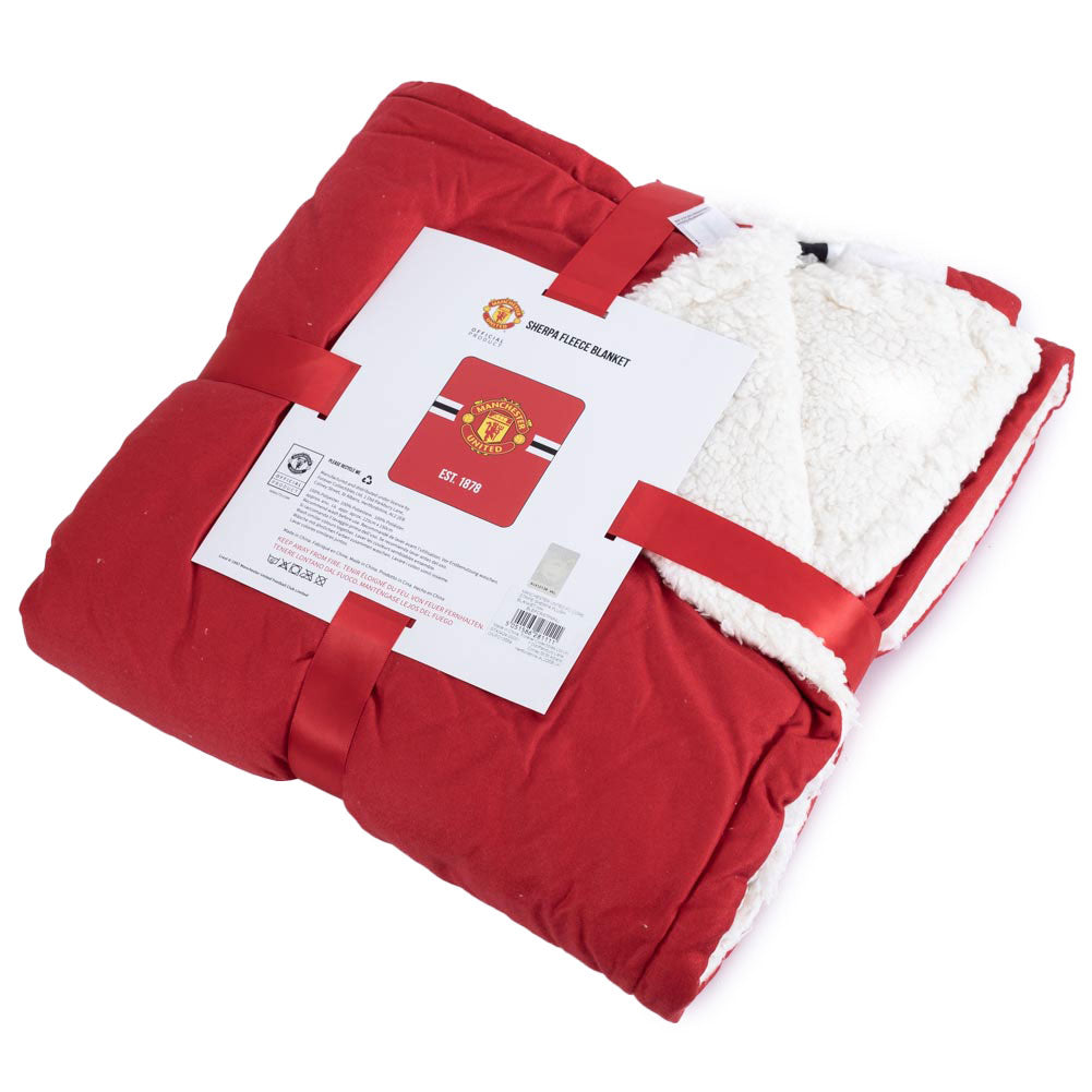 Luxury red blanket featuring a core stripe design and a Manchester United FC full colour crest, Super soft and warm white sherpa fleece reverse