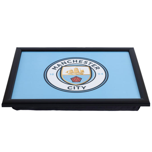 Cushioned lap tray with a black frame, Featuring the Manchester City crest on a sky blue background
