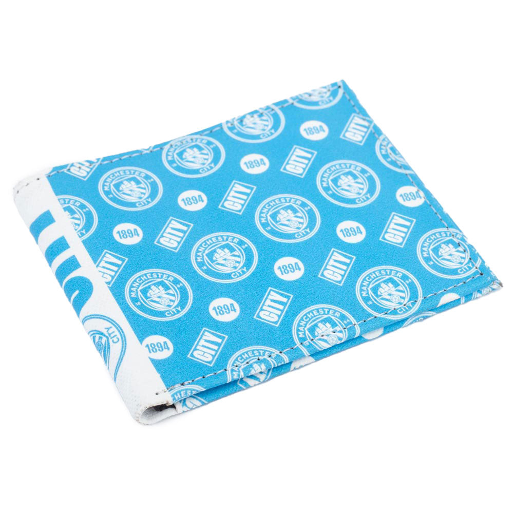 Vibrant brushed canvas wallet featuring an Man City multi icon design