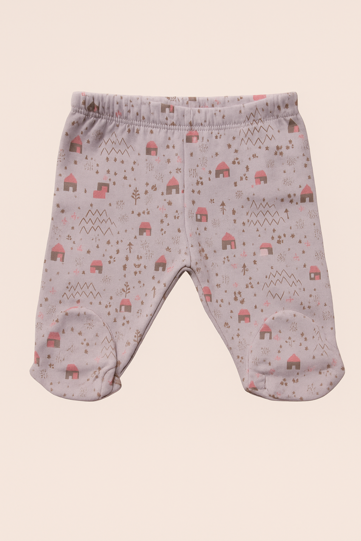 Baby leggings with a pattern on a beige background
