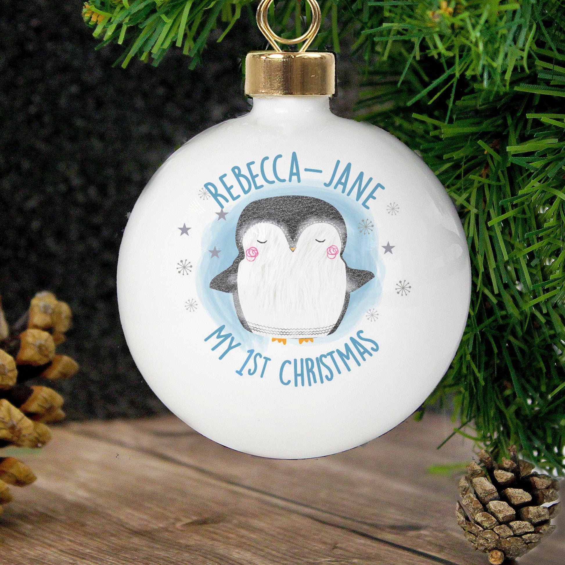 White Ceramic 1st Christmas penguin design can be personalised with a name By Sweetlea Gifts