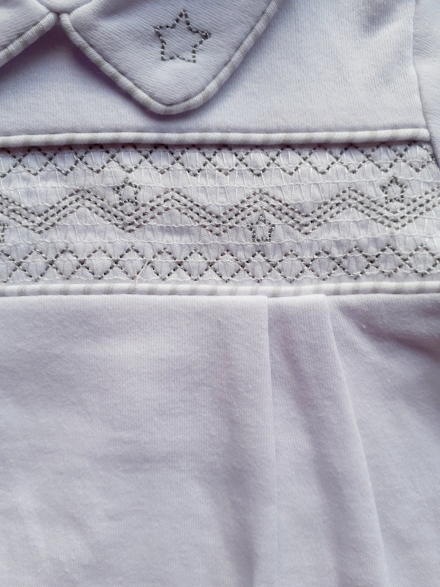White Stars Smocked Babygrow