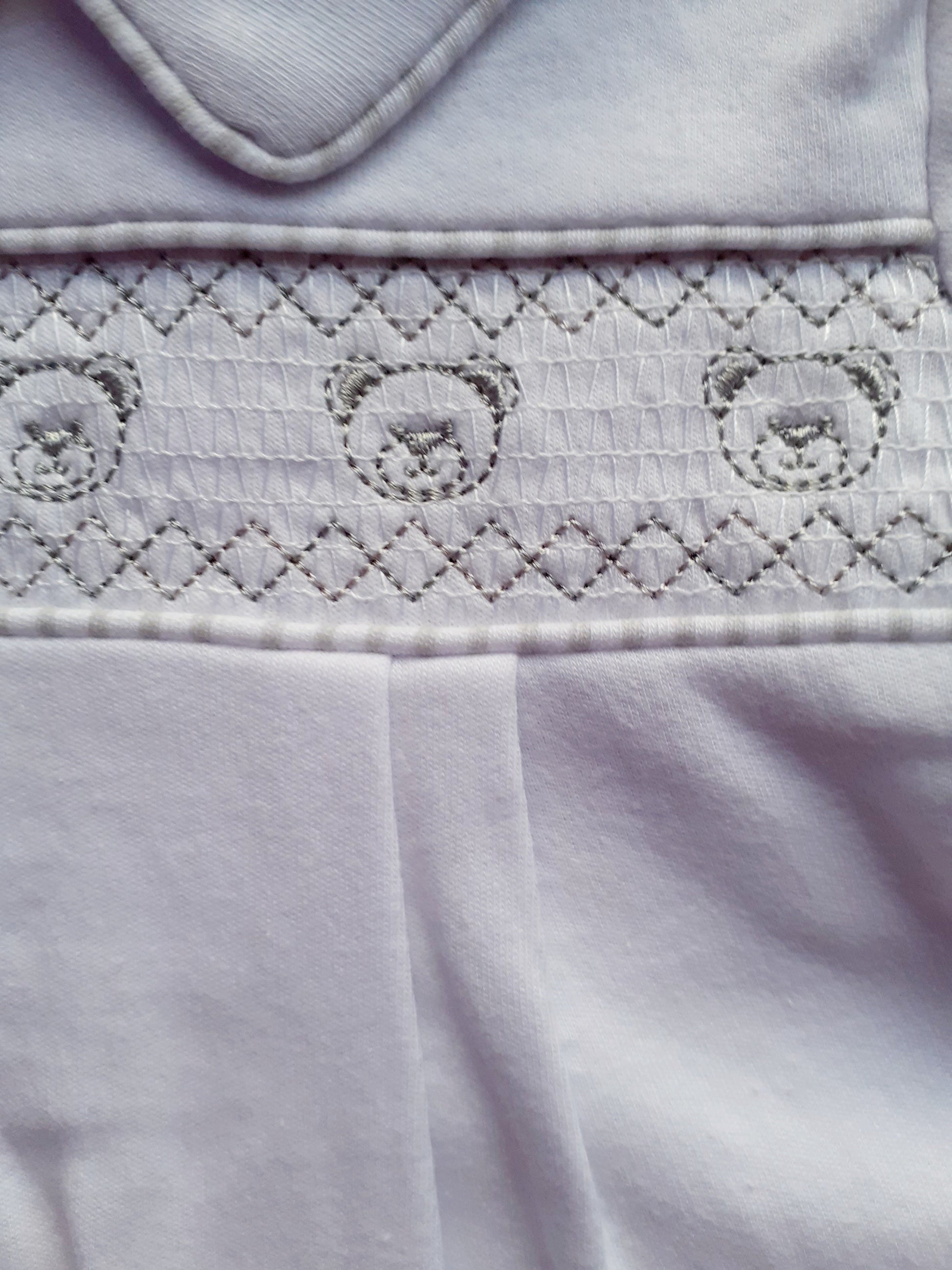 Bear head smocked design