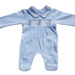A blue smocked babygrow with a fox motif on the chest area.