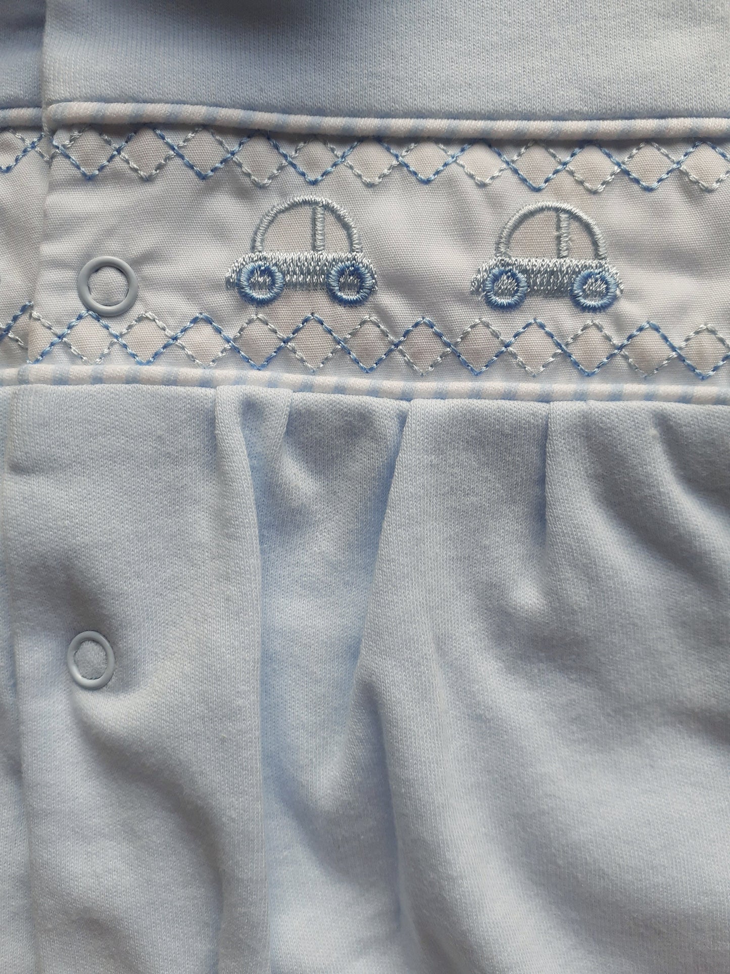 Embroidered blue car