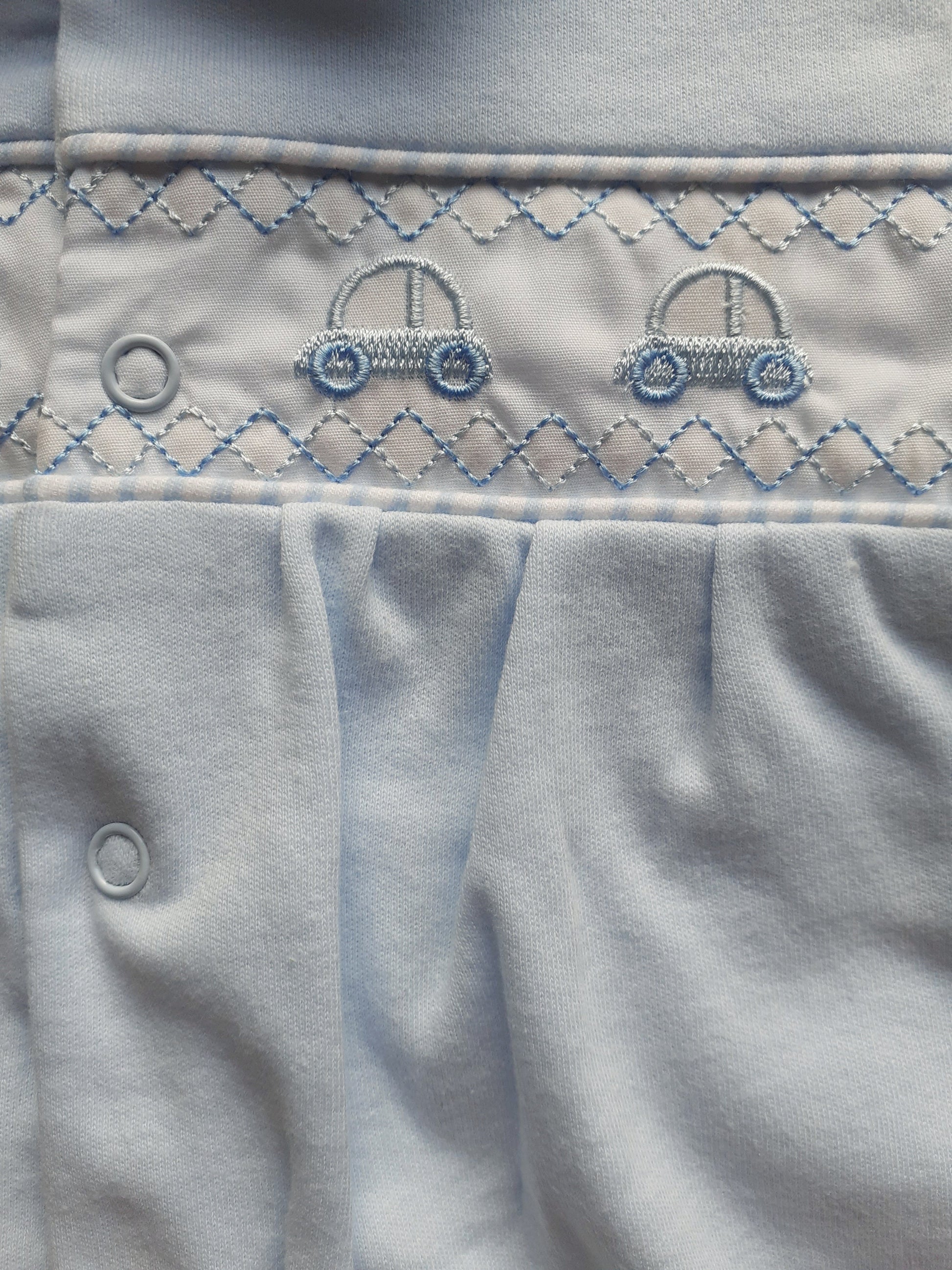 Embroidered blue car
