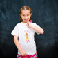 Young Girl wearing a white personalised Birthday T-shirt with a fairy princess image, name and age printed on it By Sweetlea Gifts
