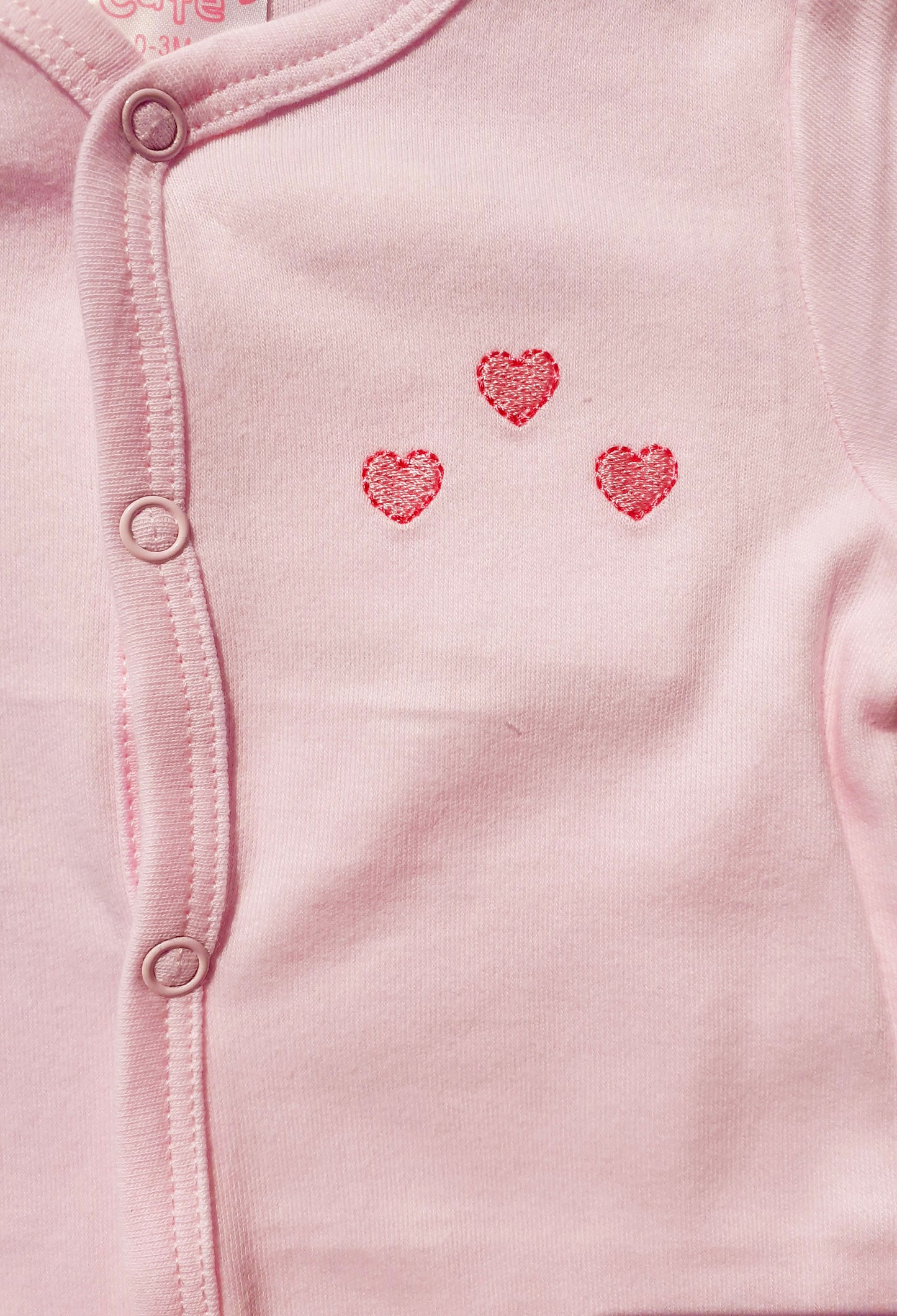 Baby girl hearts pink babygrow