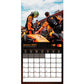 A vertical January 2027 wall calendar page featuring a Formula 1 race scene with an orange car and drivers, plus a black monthly calendar grid at the bottom with sponsor logos.
