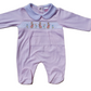 Pink collared babygrow with smocked bunny design