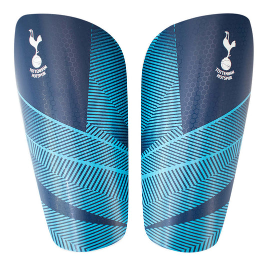 Blue fuse design slip in shin guards featuring a white Tottenham crest