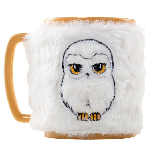 Enjoy your drink with a touch of magic... this mug combines a unique design along with a removable fluffy cover for added comfort