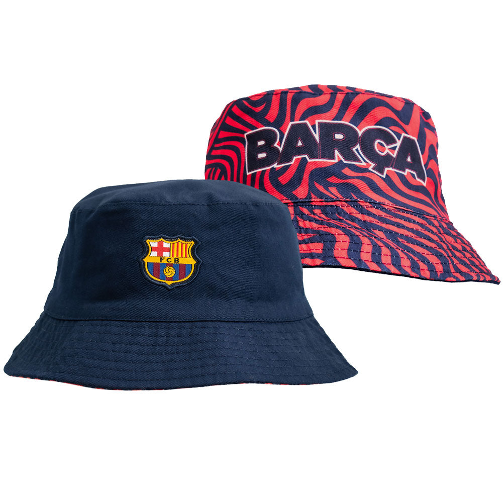 Fitted reversible bucket hat in navy with a red and navy pattern on reverse