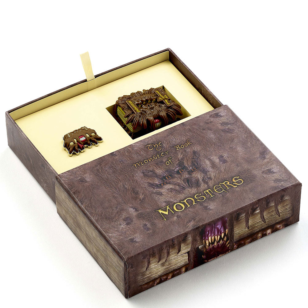 Magical Monster Book keepsake gift box with a Monster Book Keyring and Pin Badge inside