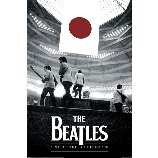 A poster print of The Beatles' 'Live at the Budokan '66' featuring a black and white photograph of the band performing in a stadium, with a large red Japanese flag graphic at the top and the band's name in bold white text at the bottom.