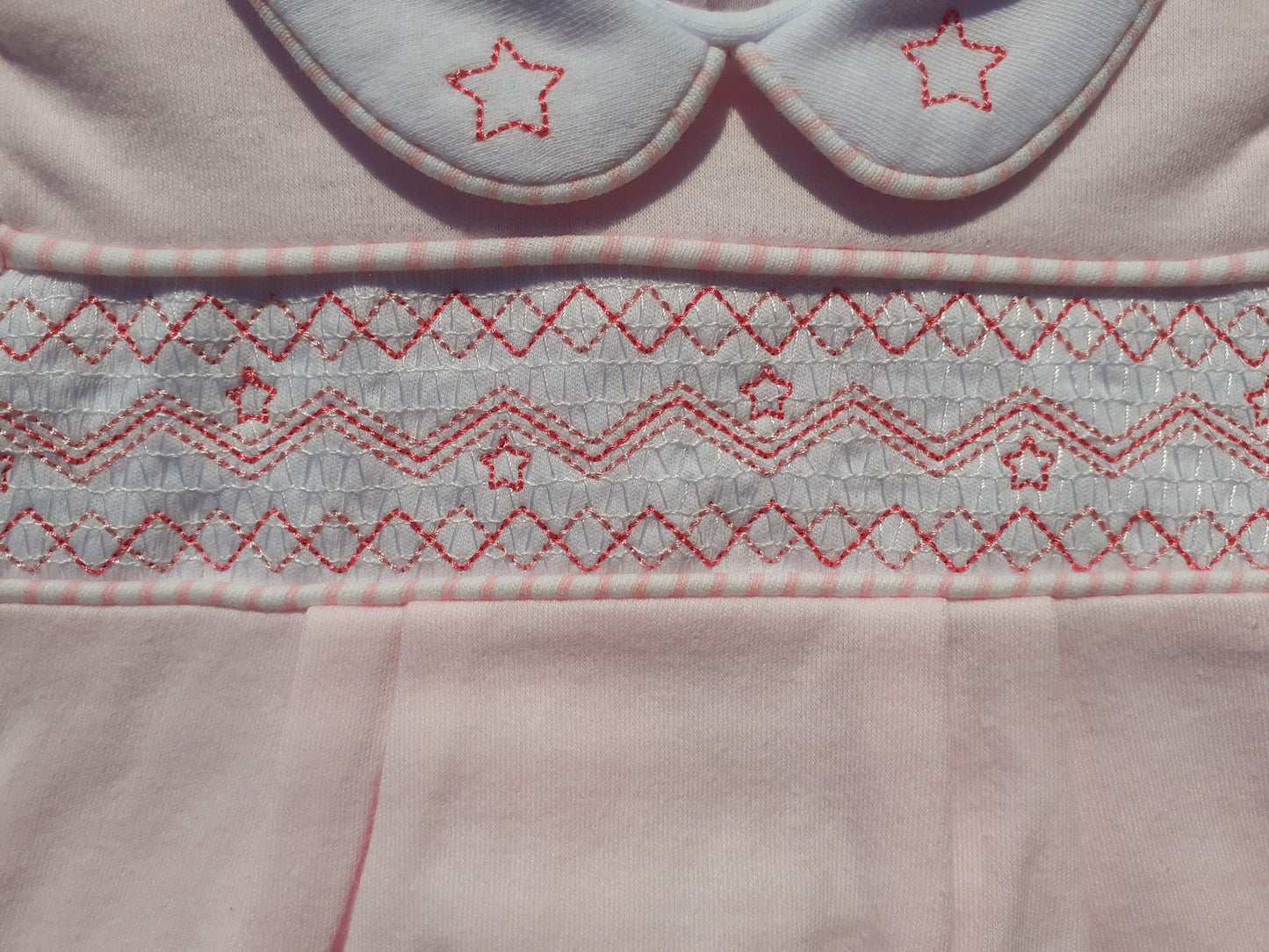Smocked pink Babygrow
