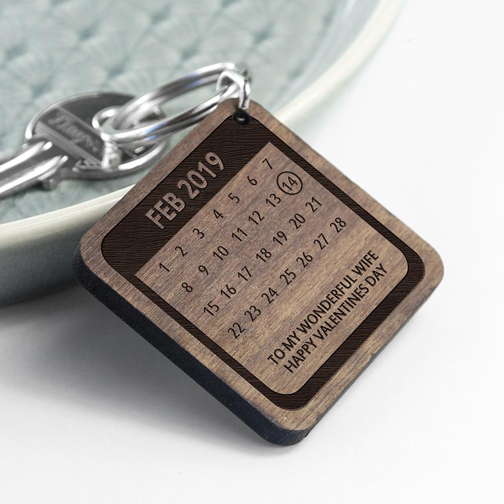 Wooden keyring displaying a calendar month with chosen day circled and personalised with a message By Sweetlea Gifts
