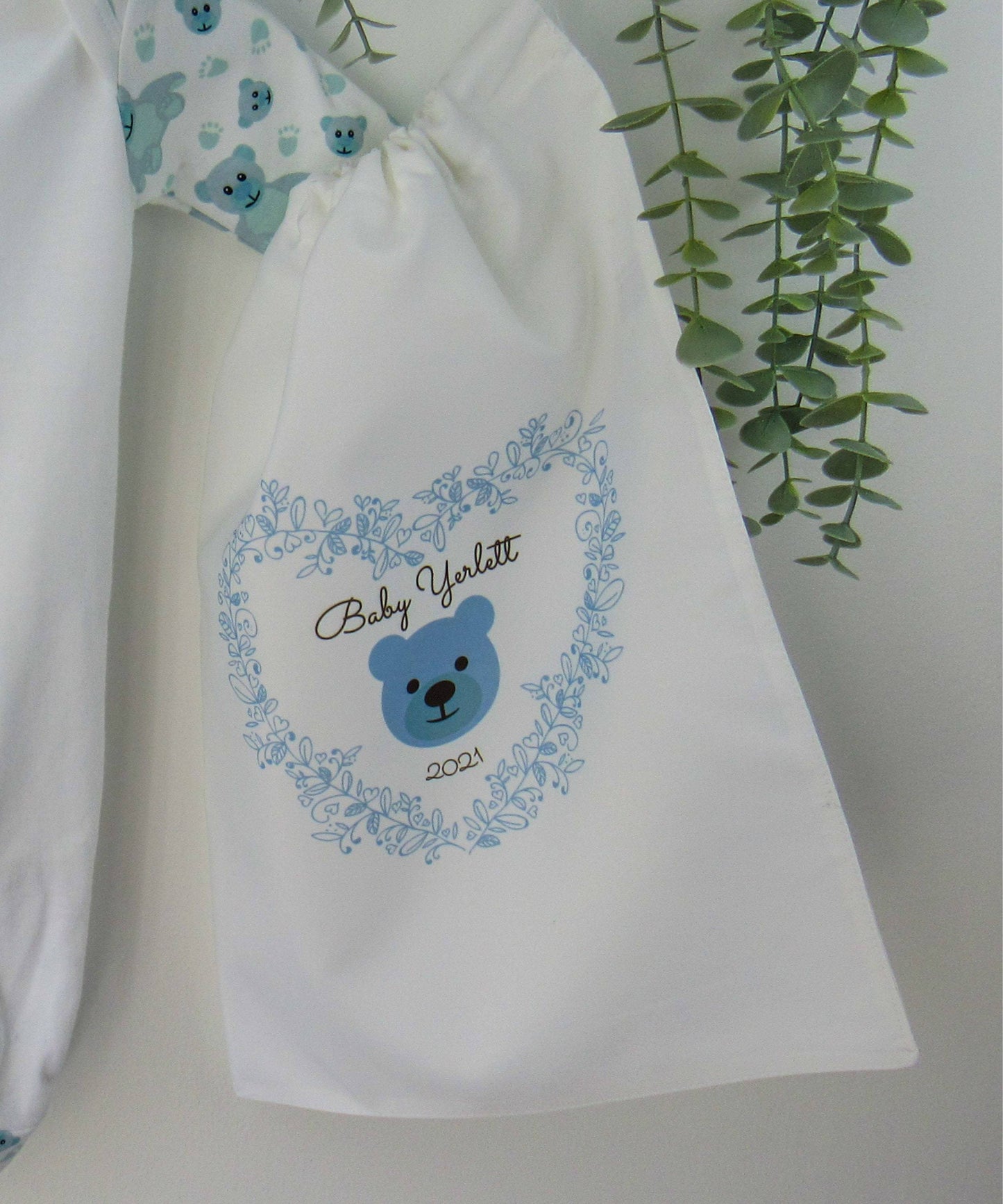 White drawstring gift bag printed with Blue Hello Bear motif with baby name and year ] By Sweetlea Gifts