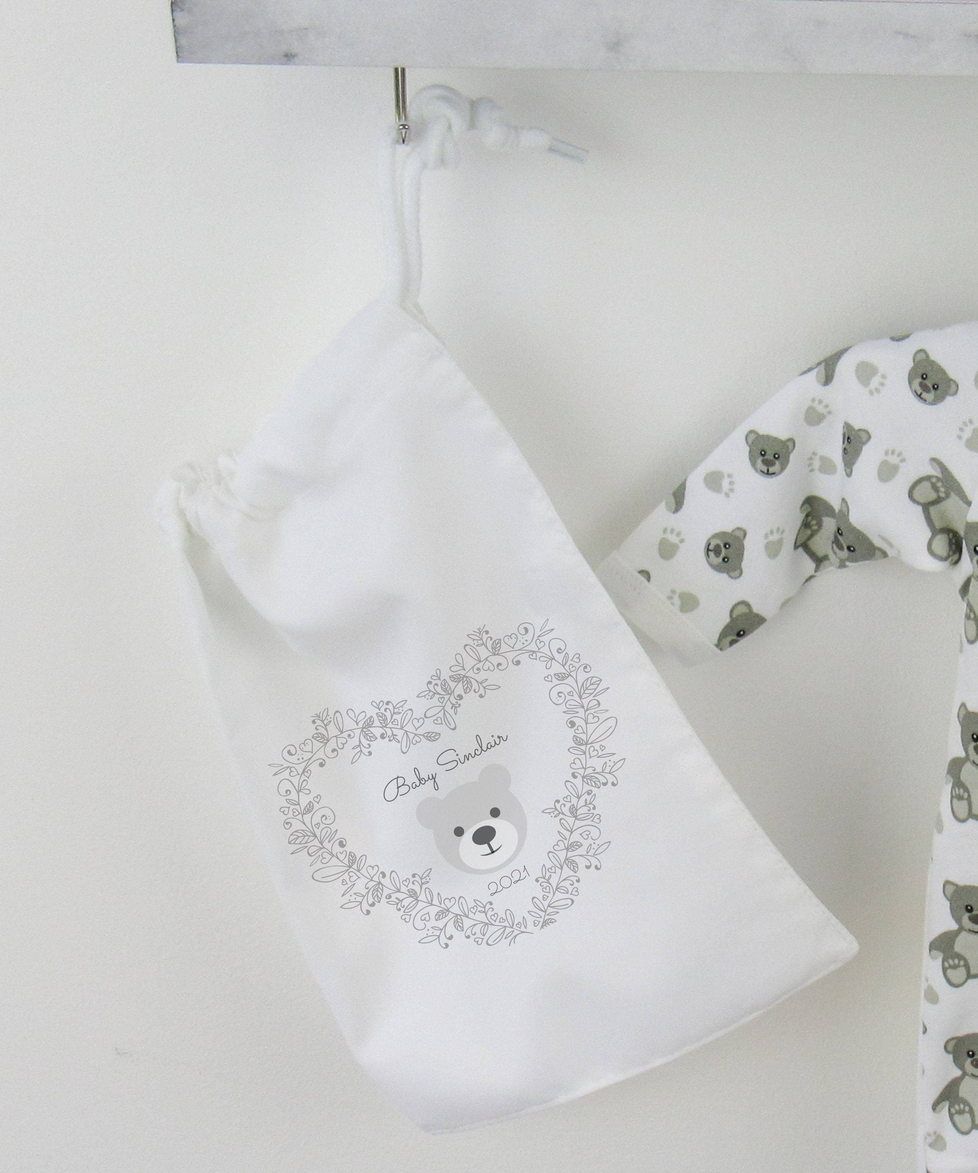 White drawstring bag printed with Grey Hello Bear Motif baby name and birth year By Sweetlea Gifts