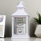 White lantern with black text printed on the front pictured with a potted succulent plant and silver photo frame on a white surface. By Sweetlea Gifts